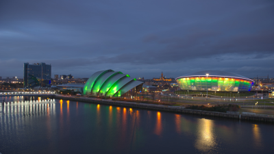 A photo of Glasgow across the Clyde at night
