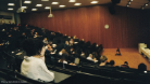 A photo of people sitting in a lecture theatre