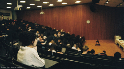 A photo of people sitting in a lecture theatre