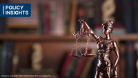 A photo of lady justice statue with text that reads Policy Insights