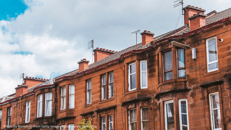 A photo of housing in Glasgow, via Canva Pro
