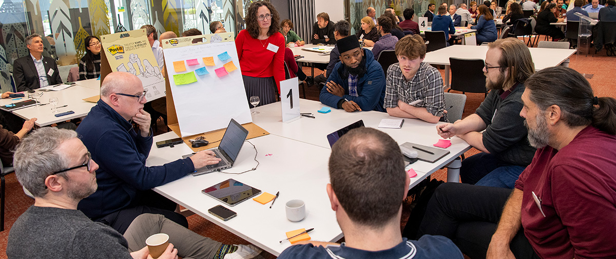 People at a conference in discussion