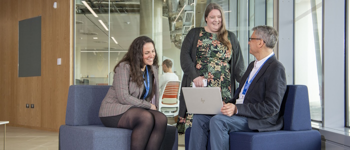 3 staff members in discussion